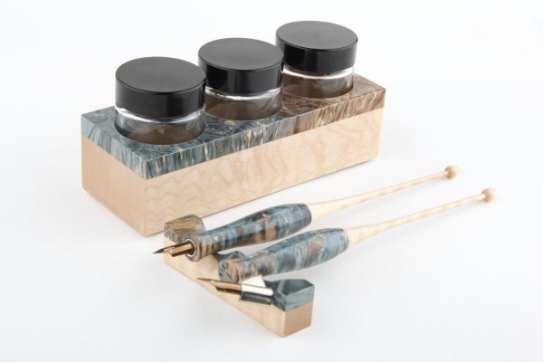 Calligraphy set made of stabilized maple burl and curly maple wood. Finished with a clear coat.